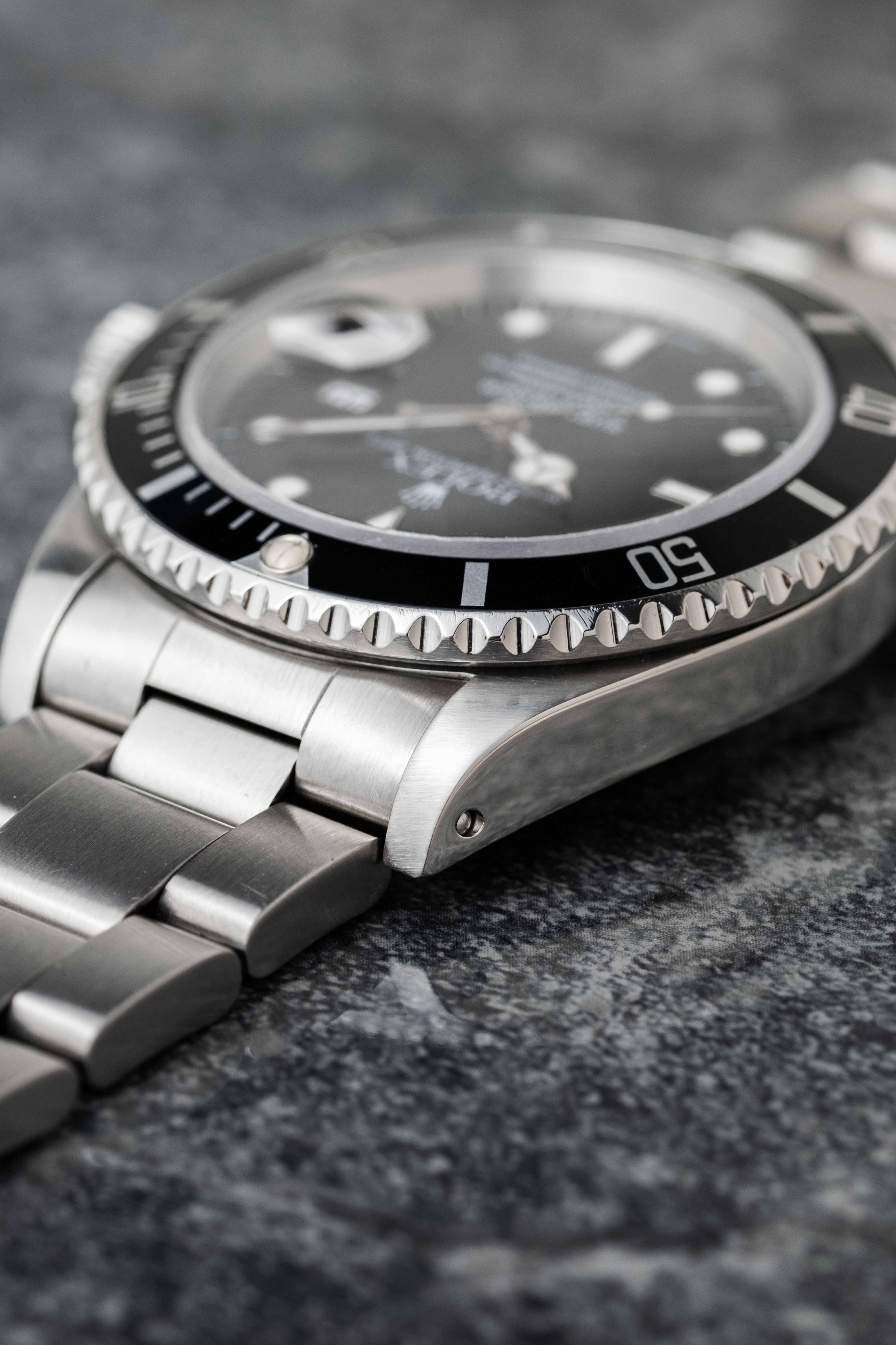 Rolex Submariner Ref. 16610 Date 1996 w/ Box & Papers